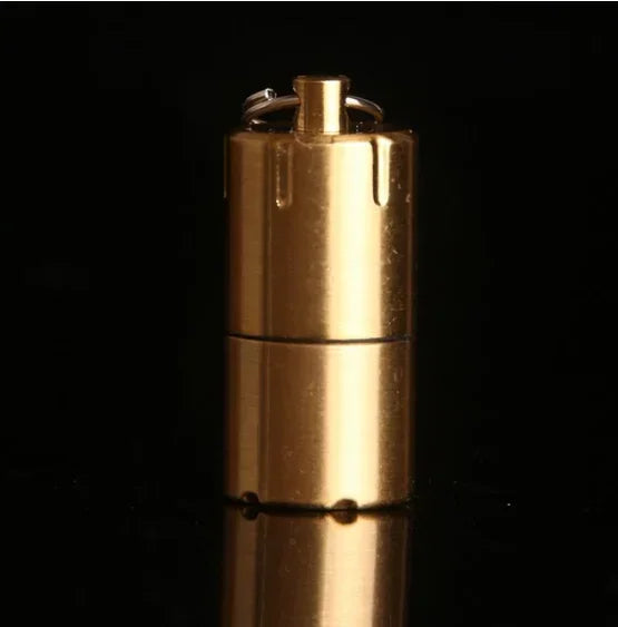 Compact and stylish, this Mini Windproof Metal Kerosene Lighter Keychain – Refillable Survival Fire Starter is perfect for any adventure.