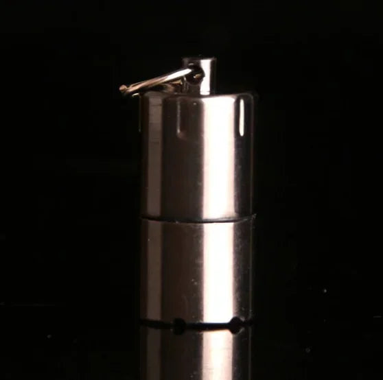 Compact and sleek, the Mini Windproof Metal Kerosene Lighter Keychain – Refillable Survival Fire Starter is perfect for adventures.