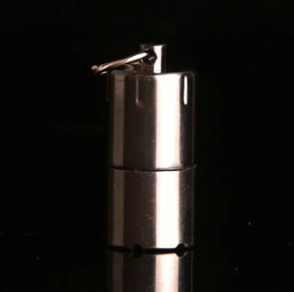 Compact and sleek, the Mini Windproof Metal Kerosene Lighter Keychain – Refillable Survival Fire Starter is perfect for adventures.