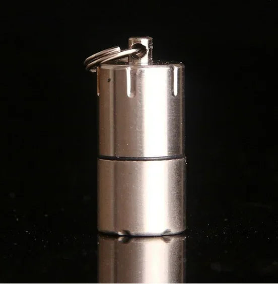 Mini Windproof Metal Kerosene Lighter Keychain – Refillable Survival Fire Starter, compact and essential for outdoor adventures.