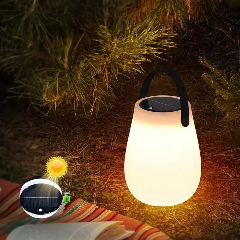Illuminate your outdoor adventures with the Solar LED Table Lantern – Portable Outdoor Camping Light, USB rechargeable and weatherproof.
