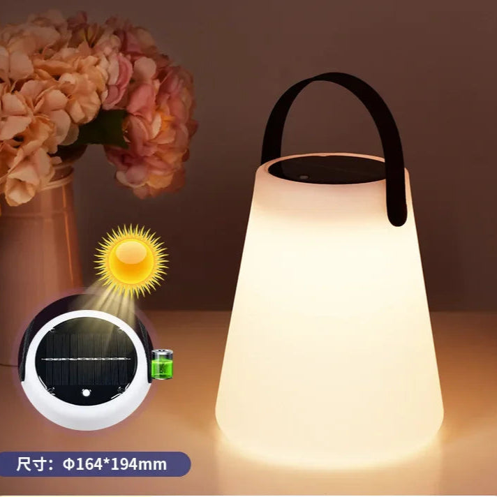 Sleek Solar LED Table Lantern – Portable Outdoor Camping Light | USB Rechargeable, Weatherproof with silicone handle.