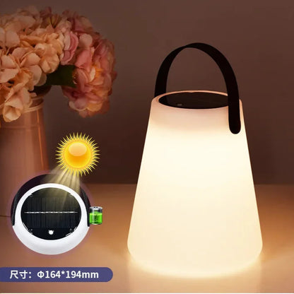 Sleek Solar LED Table Lantern – Portable Outdoor Camping Light | USB Rechargeable, Weatherproof with silicone handle.