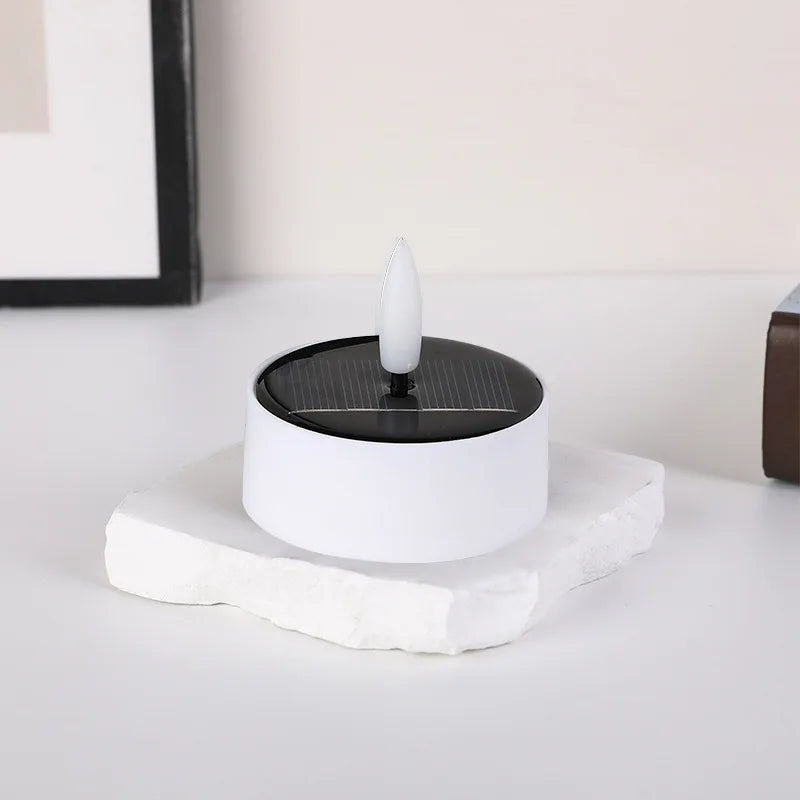 Solar Flameless LED Tea Light Candle – 6cm Flickering Yellow Light for safe outdoor ambience, camping, and emergencies.